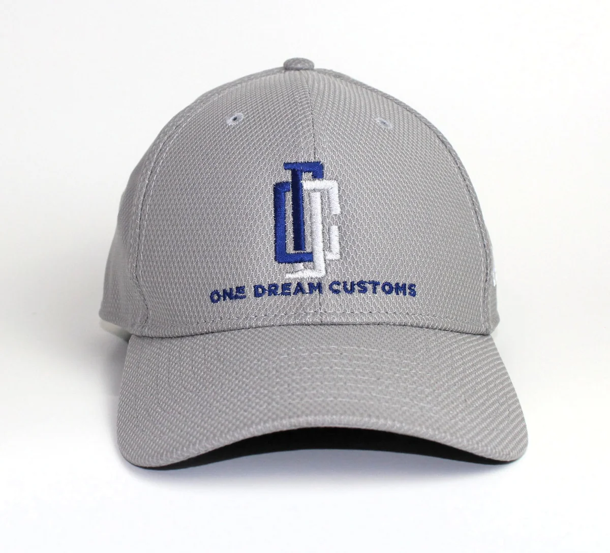 Gray hat with embroidered One Dream Customs logo
